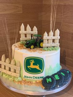 there is a cake that has been made to look like a farm scene on it