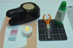 some crafting supplies are sitting on a table