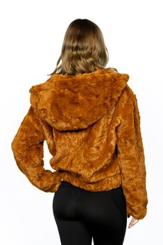 Step into the colder seasons with our Hooded Faux Fur Jacket, an item from the Sadira Collection that perfectly encapsulates the blend of comfort and style. This jacket is also a tasteful addition to the Scarlet Peaks ensemble, allowing you to embrace the captivating allure of autumn's beauty and the magic of the great outdoors. Made from 100% polyester, this hooded fur jacket offers a relaxed fit that ensures maximum comfort without compromising on style. The zip-front closure and side pockets add practicality, making it your go-to outerwear for the chilly weather. And let's not forget about the care instructions - this jacket is dry clean only, ensuring it maintains its plush texture and rich color for many seasons to come. The Sadira Collection is all about wearing clothes that make you Cozy Jacket, Crafts From Recycled Materials, Hooded Faux, Dog Gear, Autumn Beauty, Chilly Weather, Cold Season, Wearing Clothes, Faux Fur Jacket