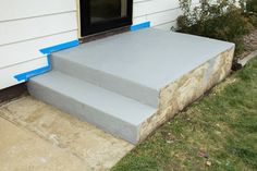 the steps are made out of concrete and blue tape