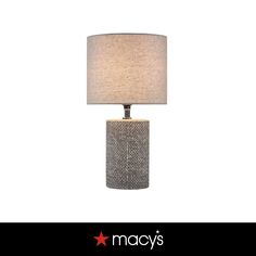 a table lamp that is on top of a white background with the words macy's above it