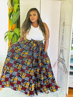 Slip into easy sassiness with this African Print maxi skirt. Has pockets. This comfortable skirt has an elastic waistband with 2 straps and should fit up to a 2X waist. Length is 42". 100% cotton. Hand wash in cold water. Warm iron. Cotton Tiered Maxi Skirt With Pockets, Cotton Gathered Maxi Skirt, Cotton Maxi Skirt With Gathered Detail, Cotton Maxi Skirt With Side Pockets, Cotton Maxi Skirt With Side Pockets And Relaxed Fit, Cotton Maxi Skirt With Pockets, Cotton Long Wrap Skirt With Pockets, Cotton Maxi Skirt With Elastic Waistband, Casual Cotton Tiered Wrap Skirt