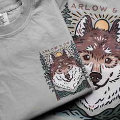 Introducing our very first Arlow & Co graphic t-shirt! A beautiful outdoorsy illustration by cindyroamingdesigns. Each t-shirt is pressed house on a comfort colors unisex shirt. T-shirts are made of a soft cotton blend and features a vibrant direct to fabric transfer design that won't fade or crack. color pictured: ssandstone Shop our coordinating bandana here: Care Instructions:• DO NOT dry clean• Machine wash COLD with mild detergent• Turn inside out when washing• Dry on low setting or hang to One Color Shirt Design, Nature T-shirt, Nature Tshirt Design, Outdoorsy Illustration, Nature Shirt Design, T Shirt Painting Ideas, Animal Tshirt Design, Cool Tshirt Designs, Pump Covers