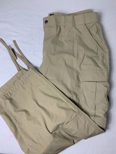 5.11 Tactical Series Capri Pants Size 3x (47.5-51) Material: cotton and polyester Color: tan bag 22r JN Beige Cargo Pants For Outdoor Activities, Beige Cargo Pants With Side Pockets For Outdoor Activities, Tan Bag, Capri Pants, Capri, Pants, How To Wear, Color, Trousers