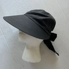 Nwot Black Visor Hat With Large Visor. It Has A Bow In The Back. This Hat Is 100% Cotton. One Size Fits All Super Cute And Perfect For Summer Smoke Free Home Black Lightweight Casual Sun Hat, Lightweight Black Casual Sun Hat, Lightweight Black Hat For Beach, Lightweight Spring Bucket Hat, Lightweight Wide Brim Black Hat, Lightweight Black Wide Brim Hat, Casual Black Visor Sun Hat, Lightweight Casual Bucket Hat, Black Brimmed Travel Hat