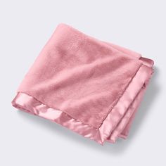 a pink towel folded on top of each other