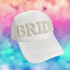 Looking for the perfect accessory for your bachelorette party or wedding weekend? Look no further than our collection of stylish and practical white baseball caps!  With options for brides, bridesmaids, and the whole tribe, our caps are the perfect way to celebrate your special day and make a statement wherever you go! Our white bride baseball cap is the perfect way to show off your new title and make sure everyone knows you're the center of attention. Made with high-quality materials and attention to detail, this cap is both stylish and durable, with a classic design that will never go out of style. For the rest of your tribe, we offer a stylish tribe baseball cap that's perfect for celebrating your friendship and showing off your group pride. With its eye-catching design and high-quality White Adjustable Baseball Cap For Party, White Trucker Baseball Cap For Party, White Snapback Trucker Hat For Party, Bachelorette Party Adjustable Trucker Hat, Adjustable Trucker Cap For Bachelorette Party, Adjustable Trucker Hat For Bachelorette Party, White Cap Mini Hat For Weddings, Adjustable White Mini Hats For Bachelorette Party, White Adjustable Snapback Mini Hats