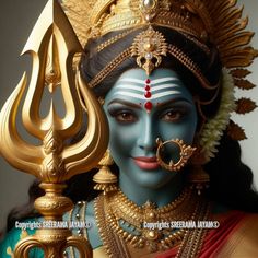 a close up of a person with makeup and jewelry on their face, wearing an elaborate headdress