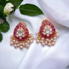 Silver Moissanite Polki Chandbali, Ruby Polki Earring, Wedding Jewelery, Moissanite Polki Earring, Ruby Earring Stud, Wedding Jewellery Gift *𝐀𝐛𝐨𝐮𝐭 𝐏𝐫𝐨𝐝𝐮𝐜𝐭* Product Code :- TE 1029 Product Type :- Stud Earring Product Weight :- 20.478 Gram Gemstone Used :-  Moissanite Polki, Labmade Ruby Material :- 925 Sterling Silver, Moissanite Polki, Labmade Ruby Size :- 4.7x2.1 Cm Intricate, hand-crafted, Pure Silver Polki Earrings, studded with high-quality Moissanite Polki comes with Clip-On, made in 92.5 silver with 22ct gold plating. The product comes with 92.5 silver stamping -Product can be made in gold as well. -If any product is not ready, It takes 2-3 weeks to make in pure silver -We also look forward to Bulk Orders. We shall consider special discount on Bulk Orders. Navrii (TM) b Traditional Pearl Drop Earrings For Reception, Fusion Style Wedding Danglers With Cutdana, Fusion Style Cutdana Danglers For Wedding, Fusion Style Meenakari Bridal Earrings For Reception, Traditional Wedding Earrings With Cutdana, Pearl Earrings With Cutdana For Weddings And Festivals, Traditional Diamond Earrings For Wedding And Festive Occasions, Wedding Pearl Earrings With Cutdana For Festivals, Wedding Earrings With Stone Work