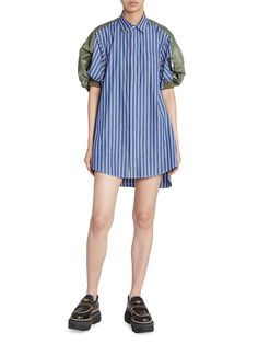 "Find SACAI Nylon Twill & Cotton Shirtdress on Editorialist. Blended both nylon twill and poplin cotton, Sacai's maximalist-style shirtdress features a spread collar and puff short sleeves. Spread collar Short puff sleeves Chest patch pocket Concealed button-front closure 65% polyester/35% nylon Combo: 100% cotton Trim: 50% cotton/50% polyester Lining: 100% cotton Dry clean Made in Japan SIZE & FIT Model measurements: 5'10\" tall Model is wearing a US size 4 This brand fits slightly larger. Cons Spring Dresses With Pleated Sleeves, Spring Workwear Shirt Dress With Gathered Sleeves, Spring Shirt Dress With Gathered Sleeves For Work, Chic Spring Shirt Dress With Pleated Sleeves, Chic Shirt Dress With Pleated Sleeves For Spring, Chic Pleated Sleeve Shirt Dress For Spring, Chic Spring Shirt Dress With Gathered Sleeves, Spring Chic Shirt Dress With Gathered Sleeves, Chic Summer Poplin Dress