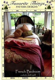 a bed with pillows and blankets on it in front of a window that reads, favorite things pattern designs