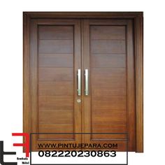 an image of a wooden door with metal handles