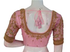 Add a touch of elegance and femininity to your Indian attire with this beautiful pastel pink tissue aari work blouse. Handcrafted with intricate embroidery and delicate designs, this blouse is perfect for weddings, parties, or any special occasion.  * This Is A Fully Stitched Saree Blouse, Ready To Wear * Made of Tissue silk, Lined With Cotton * Opens From Front With Hook and eye-fitting MEASUREMENTS: Sleeve: 10.5 inches  Size: 38,40,42 Blouse Length: 15 inches  Neck Depth: Front-7.5 inch , Back Pastel Pink Aari Work Blouse, Bridal Saree Blouse, Saree Bluse, Handwork Blouse, Stitched Saree, Aari Work Blouse, Saree Blouses, Sari Blouse, Bridal Blouse Designs