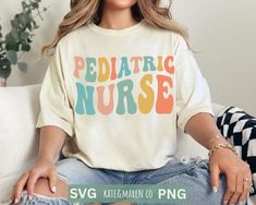 a woman sitting on top of a white couch wearing a shirt that says pediatric nurse