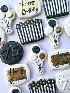 decorated cookies are arranged in the shape of hair combs and birthday candles for someone's 25th birthday