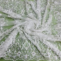 Discover exquisite elegance with the exquisite Beaded & Sequined Lace Fabric Embroidered on 100% Polyester Net Mesh from Lace USA! Our luxury lace fabric features gorgeous hand-beaded and sequined detailing, perfect for couture lace, bridal lace, evening dress lace, Quinceanera dress lace, dance costume lace, and so much more. This sumptuous fabric is perfect for any special occasion, from weddings to formal dances and everything in between. The embroidered lace is available in two stunning colo Formal Dance, Quinceanera Dress, Lace Bridal, Lace Evening Dresses, Dance Costume, Quinceanera Dresses, Bridal Lace, Dress Lace, Ivory Color