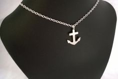 Samaritan Jewelers creates sustainable, conflict free, individually handcrafted jewelry. A symbol for hope. This handcrafted nautical pendant is perfect for everyday wear. * Individually handmade using the ancient technique of sand casting * Cast using only the purest sterling silver (nickel free) * Solid throughout * Measures approximately 27mmX18mm * Chain not included (pick out your favorite chain from my shop using this link) https://www.etsy.com/shop/SamaritanJewelers?section_id=15712434&am Symbol For Hope, Nautical Necklace, Anchor Pendant, Anchor Necklace, Sand Casting, Necklace Pendant, Handcrafted Jewelry, Necklace Etsy, Diamond Necklace