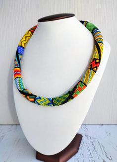 Check out this item in my Etsy shop https://www.etsy.com/listing/682527802/rainbow-bead-jewelry-bead-crochet Multicolor Crochet Necklaces, Adjustable Crochet Necklaces With Round Beads, Crochet Beaded Necklaces With Round Beads For Gift, Necklace Crochet, Diy Jewelry Necklace, Necklace Bead, Crochet Rope, Rainbow Beads, Metal Accessories