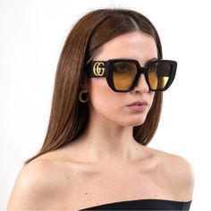 Gucci Acetate Square Frame Sunglasses Gg0956s Black This Is An Authentic Pair Of Gucci Acetate Square Frame Sunglasses Gg0141s In Black. These Bold Sunglasses Have Black Oversized Square Frames With Translucent Yellow Lenses. The Arms Are Black And Feature A Gold Gg Logo At The Hinge. Size Length: 5.75 In Height: 2.50 In Width: 5.75 In Luxury Acetate Sunglasses With Tinted Lenses, Luxury Acetate Cat Eye Sunglasses With Polarized Lenses, Evening Acetate Sunglasses With Mirrored Lenses, Luxury Cat Eye Sunglasses With Polarized Lenses, Luxury Tinted Lenses Sunglasses In Acetate, Luxury Acetate Sunglasses With Mirrored Lenses, Luxury Gucci Cat Eye Sunglasses For Summer, Luxury Acetate Cat Eye Sunglasses, Designer Cat Eye Sunglasses With Mirrored Lenses