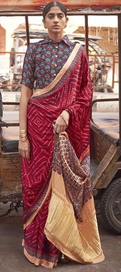 Red and Maroon color Saree in Viscose fabric with Bandhej, Printed work Red Art Silk Pre-draped Saree With Self Design, Red Pre-draped Saree With Pallu For Eid, Red Bandhani Print Pre-draped Saree In Art Silk, Red Chanderi Set With Bandhani Print, Red Kalamkari Print Lehenga With Traditional Drape, Red Lehenga With Kalamkari Print In Traditional Drape, Red Kalamkari Print Lehenga In Traditional Drape, Red Bollywood Lehenga With Kalamkari Print, Red Kalamkari Print Lehenga For Festivals