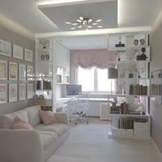 a living room filled with white furniture and lots of pictures on the wall above it