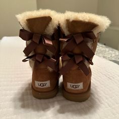 Brand New, Never Worn Women’s Ugg Bailey Boots With Satin Bow Accents. Ugg Bow Boots Outfit, Elliana Aesthetic, Bailey Bow Uggs Outfit, Bailey Uggs, Ugg Boots Women, Ugg Boots With Bows, Ugg Bailey Boots, Cute Uggs, Uggs With Bows