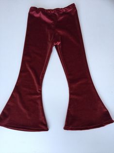 Velvet bottoms on velvet fabric Fitted Wide Leg Winter Bottoms, Stretch Flare Bottoms For Fall, Winter Solid Full-length Bottoms, Stretch High-waisted Winter Pants, Fitted Bottoms For Fall, Stretch High Waist Bottoms For Fall, Spring Hip-length Bottoms, High Waist Stretch Bottoms For Fall, Stretch High-waist Bottoms For Fall