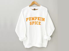 Pumpkin Spice Sweatshirt, Fall Sweatshirt Women, Fall Shirt, Pumpkin Sweatshirt, Pumpkin Shirt, Halloween Shirt ❀ Long sleeve crewneck sweatshirt. ❀ The design is printed directly onto the sweatshirt. ❀ Unisex sizing, size up if you want an oversized fit. ❀ For garment measurements, please see the size guide included in the images. Washing instructions: ❀ Wash inside out using mild detergent, on a low-temperature setting.  ❀ Let hang dry (do not tumble dry). Shop Homepage: https://www.etsy.com/s Pumpkin Sweatshirts, Pumpkin Seasoning, Pumpkin Shirt, Fall Sweatshirt, Fall Shirts, Halloween Shirt, Pumpkin Spice, Hoodies Womens, Sweatshirts Women