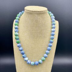 Blue and Green are perfect for Spring! Choose which necklace you would like, Blue and Green Jade or all Light Blue Aquamarine gemstones. Necklace length is approximately 17-18 inches long and has a gold tone toggle clasp. Would like to have a matching bracelet set as well? Click here and take a look at our matching Spring Fling bracelet stack! https://www.etsy.com/listing/1694995173/green-blue-spring-fling-bracelet Materials: 10mm Blue and Green Rain Flower Jade beads 10mm Aquamarine Rondelle shaped gemstones Large gold colored toggle clasp Photos show White Neutral Shell necklace sections. Please view that listing for those beaded necklace style options. Please note that natural gemstones vary in color and textures. No two gemstones or beads are alike, which makes this bracelet unique! If Beaded Necklace Green, Flower Jade, Bracelet Materials, Necklace Matching, Blue Spring, Necklace Green, Spring Fling, Matching Bracelet, Blue Springs