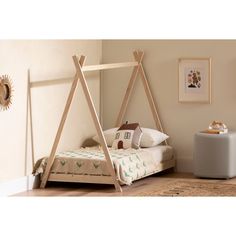 a child's bedroom with a swing bed