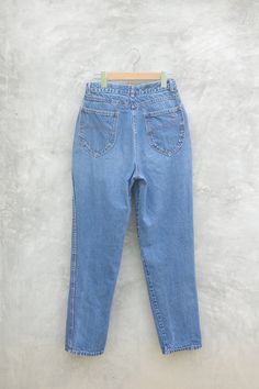 Faded Vintage chic jeans W25 W26 High waist pants Blue denim jeans,Blue jeans,retro,hipster pants,jeans classic,jeans,chic made in usa I want you to experience the beauty, style and comfort of my goods. Vintage chic jeans condition : vintage but Good color : Blue jeans Fabric Denim Label : 100% cotton Mede in usa Please refer to the pictures for more details. / I check measurements centimeters or inches 1. Waist: 25-26 inch // 63.5 or 66 cm 2. Hips: 39 or 40 inch // 99 or 101.5 cm 3. Rise: 12 in Faded High Waist Flare Jeans, Retro Straight Leg Jeans With Pockets, Retro Medium Wash Jeans With Pockets, Retro Mid-rise Jeans With Pockets, High Waist Faded Jeans, Faded High Waist Rigid Denim Bottoms, 90s Style Straight Leg Denim Pants, Retro Straight Leg Jeans, Retro Flare Jeans With Light Wash