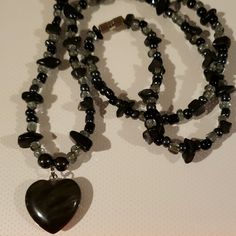 Dark Heart Of Stones Necklace Black Stones And Glass Beads Flash Made It Look Brown But You Can See The Details See Pics For Measurements Stone Heart Is Almost An Inch Wide And Tall Handmade Black Beaded Heart-shaped Jewelry, Handmade Black Heart-shaped Beaded Necklaces, Handmade Black Heart Beaded Necklaces, Handmade Black Heart-shaped Beaded Necklace, Black Heart Beaded Necklace, Black Heart Beads Necklace, Black Beaded Necklaces With Heart And Round Beads, Adjustable Black Beaded Necklace With Heart Beads, Black Beaded Necklaces With Heart-shaped Beads