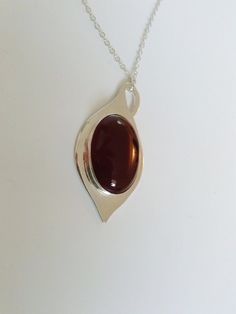 "this beautiful red carnelian is settle on a Silver tear drop hand made with sterling silver, it has a loop that can be used as bail. The stone is 18 x 25 mm and the teardrop is 0.8 mm thick, the chain is 16 inches and 1 mm thick This a special design matches with the carnelian rings that you can see in these links: http://etsy.me/1Tzy0fP http://etsy.me/1TyuVSF *This jewel will be sent to you in a gift box * All the pieces are Hand Made * Custom order We will be glad to make any size, style, oth Polished Oval Carnelian Jewelry, Red Carnelian Teardrop Necklace, Oval Carnelian Jewelry With Polished Finish, Red Carnelian Teardrop Necklaces, Carnelian Gemstone Drop Jewelry, Carnelian Oval Cabochon Gemstone Jewelry, Red Carnelian Teardrop Jewelry, Carnelian Gemstone Oval Pendant, Carnelian Gemstone Oval Pendant Jewelry