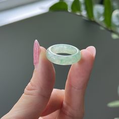 Description --------------------------------- The jade ring is 100% natural, untreated and undyed Type-A jadeite jade and is 100% handmade. Very translucent faint green base with bright apple green streak, purely created by our Mother Nature makes this ring very beautiful and unique. The sense of touch is cool. Wearing a jadeite ring symbolizes to have a peaceful life and keep you from evil spirits. It also helps to enhance longevity and luck. This ring is deserved to be addition to your collection or as a gift to someone special. **Note** There is little natural whitish wavy color vein that is not feelable. There are a few tiny minor fingernail bumps at outer round that do not hurt the wearer. They don't affect the durability of the ring. Price is already reduced. ######Kindly feel free t Jadeite Ring, Burmese Jade, Sense Of Touch, Peaceful Life, Jade Ring, Natural Jade, Evil Spirits, Photo Editing Software, Apple Green