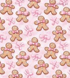 many ginger cookies with pink bows on them