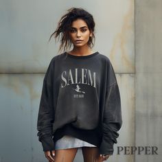 This Salem Massachusetts vintage sweatshirt is the perfect item to remember your east coast trip or Halloween witch theme gift for your friends and family. Luxurious comfort and style are what this unisex, garment-dyed sweatshirt is all about. It's made with 80% ring-spun cotton and 20% polyester and the fabric is 3-end garment-dyed, ring-spun, color-blast fleece with a 100% cotton face. Each sweatshirt comes with a relaxed fit, a rolled-forward shoulder, and a back neck patch. .: 80% ring-spun Vintage Halloween Sweatshirt For Streetwear, Vintage Long Sleeve Halloween Sweatshirt, Vintage Halloween Long Sleeve Sweatshirt, Halloween Grunge Crew Neck Hoodie, Halloween Grunge Hoodie With Crew Neck, Halloween Streetwear Sweatshirt With Relaxed Fit, Vintage Soft-washed Sweatshirt For Fall, Halloween Streetwear Sweater With Letter Print, Halloween Streetwear Crew Tops