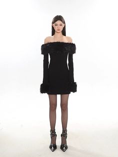 Embrace elegance with a twist in this off-shoulder faux fur trim mini dress, a chic addition to any wardrobe. Crafted with attention to detail, this dress features a sleek silhouette, long sleeves, and a playful faux fur trim that graces the shoulders, adding a touch of glamour. The fabric composition prioritizes comfort and style, ensuring a flattering fit for those evenings out or special events. Style this versatile piece with booties or heels for an evening look, or dress it down with a pair Social Gathering, Fur Trim, Mini Black Dress, Timeless Design, Fashion Forward, Faux Fur, Off Shoulder, Twist, Long Sleeves