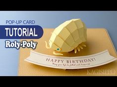 a pop up card with an origami rat on it