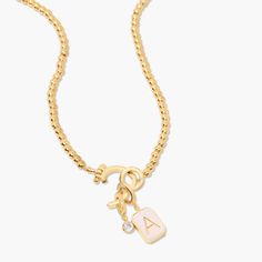 This Molly Enamel Charm Necklace is the perfect necklace to create your charm story! It comes with a blush initial enamel charm and a sparkly cz crystal charm, and the hinge closure. Available in 14k gold plated brass Avery Necklace: Size: 18" bead necklace, hinge closure measures 1/2", 4mm beads Molly Initial Enamel Charm: 3/8"x1/4" enamel filled charm, hinge closure Leia Charm: 3mm round cz bezel, hinge closure Protected with an anti-tarnish barrier With customization this item is FINAL SALE S Nails Jewelry, Tennis Jewelry, Upscale Fashion, Modern Jewellery Design, Luxe Jewelry, Jewelry Tattoo, Dope Jewelry, Nail Jewelry, Gold Charm Necklace