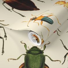 a green bug on a white wallpaper with lots of other bugs and insects around it