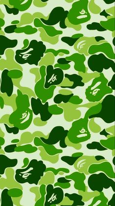 a green and white camouflage print background