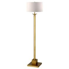 a gold floor lamp with a white shade on the base and a square light bulb