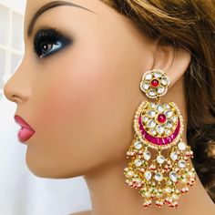 Rajwadi Kundan Chandbali/ Pink Indian Kundan Earrings/ Sabyasachi Pink Chandbali/ Ruby Wedding Earrings/ Indian Kundan Wedding Jewelry Description: Made in Brass with very high quality Kundan Stones in 22k gold finish Length: 3.5 Inches Earrings come with push back closure Lightweight Jewelry Suitable for any traditional wedding/festive occasion Follow us on social media for new and latest designs: Facebook: www.facebook.com/shoparyafashions Pinterest: www.pinterest.com/aryafashions Instagram: w White Chandbalis For Wedding And Diwali, White Jhumkas For Reception And Festivals, Traditional White Chandbalis For Wedding, Wedding Temple Jewelry Danglers With Cutdana, Festive White Cutdana Bridal Earrings, Traditional Wedding Danglers With Cutdana, Traditional Danglers With Cutdana For Wedding, White Kundan Chandbalis For Wedding, White Hand Set Chandbalis For Diwali