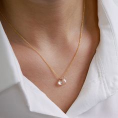 "A delicate rock crystal necklace is made to highlight Your Beauty. High-quality, flawless clear crystal quartz is neatly centered on the classic yet strong chain in the metal type and the length of your choice. Great as a gift for your beloved one on an April birthday or 10th Anniversary for your wife. Matching earrings: https://etsy.me/2lBd83i MATERIALS: * natural rock crystal (clear quartz) * tiny rondelles at the chain ends (except 14k Gold) * available 14k Gold Filled, Sterling Silver, 14k Elegant Rose Gold Crystal Necklaces With Adjustable Chain, Elegant Rose Gold Crystal Necklace With Adjustable Chain, Elegant Rose Gold Crystal Necklace With Delicate Chain, Rose Gold Crystal Necklace With Delicate Chain, Rose Gold Delicate Chain Crystal Necklace, Elegant Rose Quartz Crystal Necklace In Rose Gold, Elegant Rose Quartz Necklace Gift, Elegant Rose Gold Crystal Necklace With Round Pendant, Gold Rose Quartz Crystal Necklaces