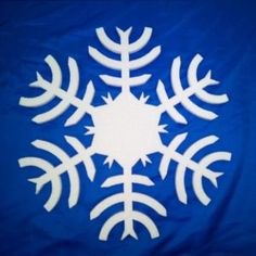 a snowflake is shown on a blue background