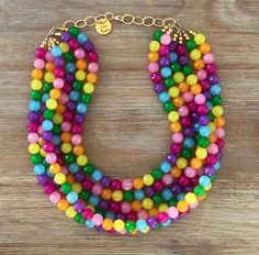 "Somewhere Over The Rainbow🌈 These beads are exquisite! This necklace goes with EVERYTHING! Simply Stunning! Necklace is 18\" long with a 4.5\" gold chain for easy adjusting Click Here for the Matching Earrings! https://www.etsy.com/listing/913142571/crystal-earring-crystal-stud-earring?ref=shop_home_active_2&sca=1&sts=1 Click Here for the Matching Bracelet! https://www.etsy.com/listing/1139788336/sparkling-bracelet-stretch-crystal?ref=shop_home_active_1&pro=1&sts=1 All our neck Rainbow Multi-strand Necklace Gift, Rainbow Multi-strand Necklace As Gift, Rainbow Multi-strand Necklace For Gift, Rainbow Multi-strand Jewelry For Gifts, Multicolor Single Strand Costume Jewelry, Lgbtq Jewelry, Colored Pearl Necklace, Rainbow Gifts, Pride Jewelry