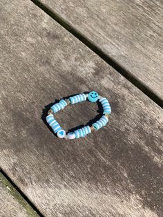 This is a preppy blue bracelet kids size Preppy Brackets, Fun Blue Bracelets For Gifts, Playful Adjustable Blue Friendship Bracelets, Playful Blue Beaded Bracelets, Blue Handmade Friendship Bracelets Playful Style, Handmade Blue Friendship Bracelets Playful Style, Handmade Blue Playful Friendship Bracelets, Handmade Playful Blue Friendship Bracelets, Playful Handmade Blue Friendship Bracelets