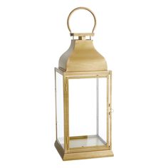 a gold colored lantern with a clear glass door and handle on an isolated white background