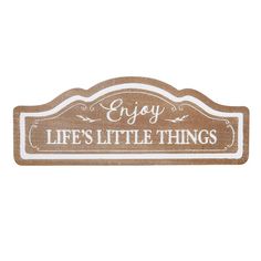 a wooden sign that says enjoy life's little things on the front and side