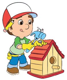 a little boy playing with a bird house